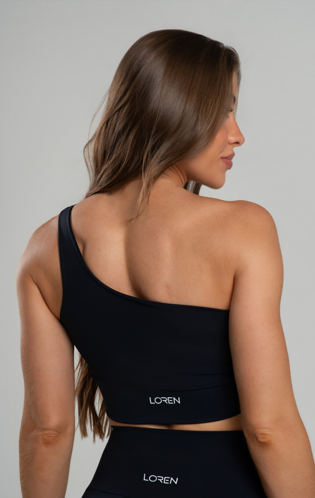 Top Fitness Feminino Pala Dupla Com Elastico Barrado Assimétrico Poliamida Zero Transparência